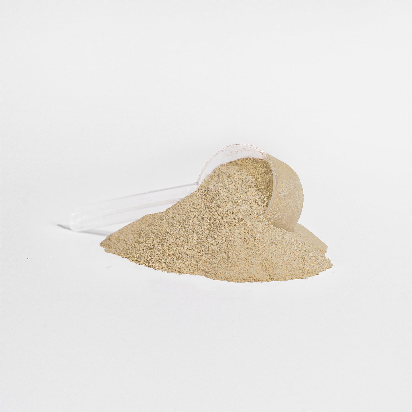 A transparent scoop is nestled in a small mound of 111 & Co. ADVANCED 100% WHEY PROTEIN ISOLATE (VANILLA), its light beige powder spilling gently to form a smooth slope on the white backdrop, invoking thoughts of muscle recovery through minimalistic simplicity and even lighting.