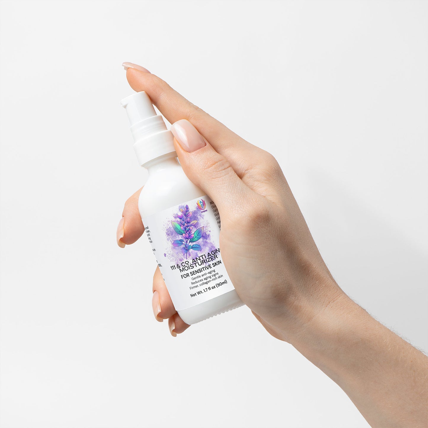 A light-skinned hand with manicured nails holds a white bottle of 111 & Co. ANTI AGING MOISTURIZER FOR SENSITIVE SKIN by 111 & Company, featuring a pump dispenser and a label with purple flowers, perfect for improving skin elasticity, set against a white background.