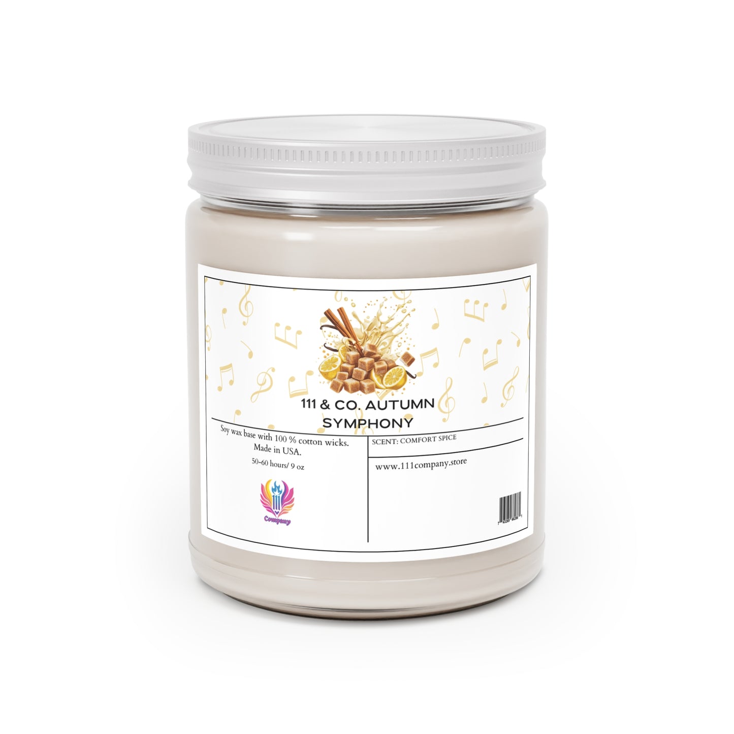The 111 & COMPANY AUTUMN SYMPHONY COMFORT SPICE candle by 111 & Company features musical notes and cinnamon sticks on a white jar, crafted in the USA with soy wax and a cotton wick for a soothing scent. A website URL is displayed at the bottom on a white background.