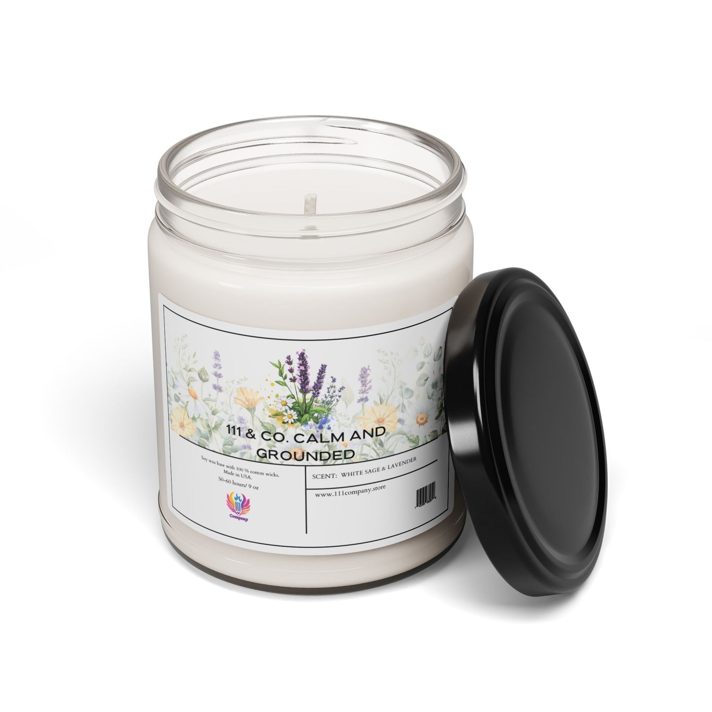 The 111 & COMPANY Calm and Grounded candle by 111 & Company, featuring a lavender and white sage scent, rests in a clear glass jar adorned with floral and greenery illustrations. The black lid accompanies the jar on a pristine surface, inviting relaxation through its soothing aroma.