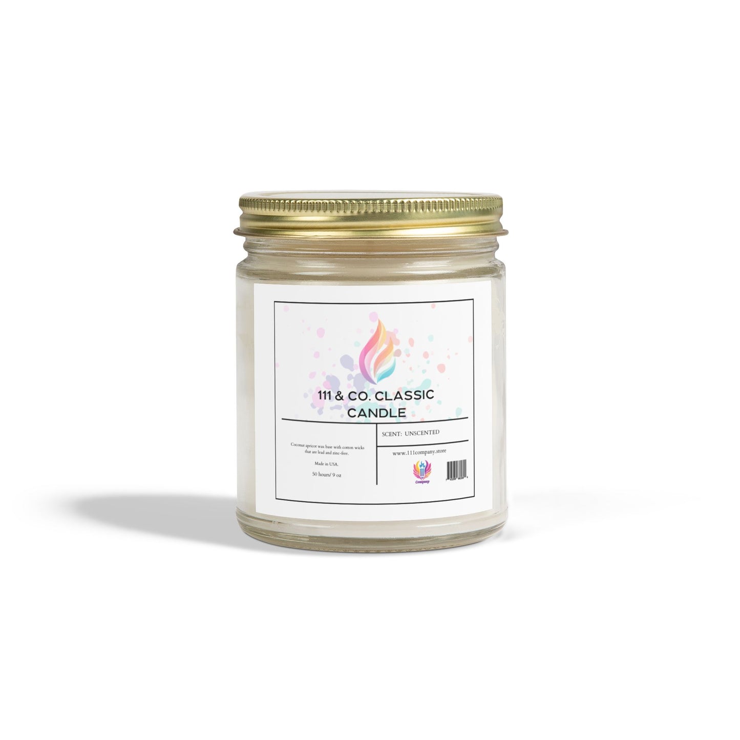 The 111 & COMPANY CLASSIC UNSCENTED CANDLE by 111 & Company features a clear glass jar with a gold screw lid, adorned with a colorful flame logo and label. The candle contains eco-friendly coconut apricot wax (9oz), emitting a calming glow on a white background.