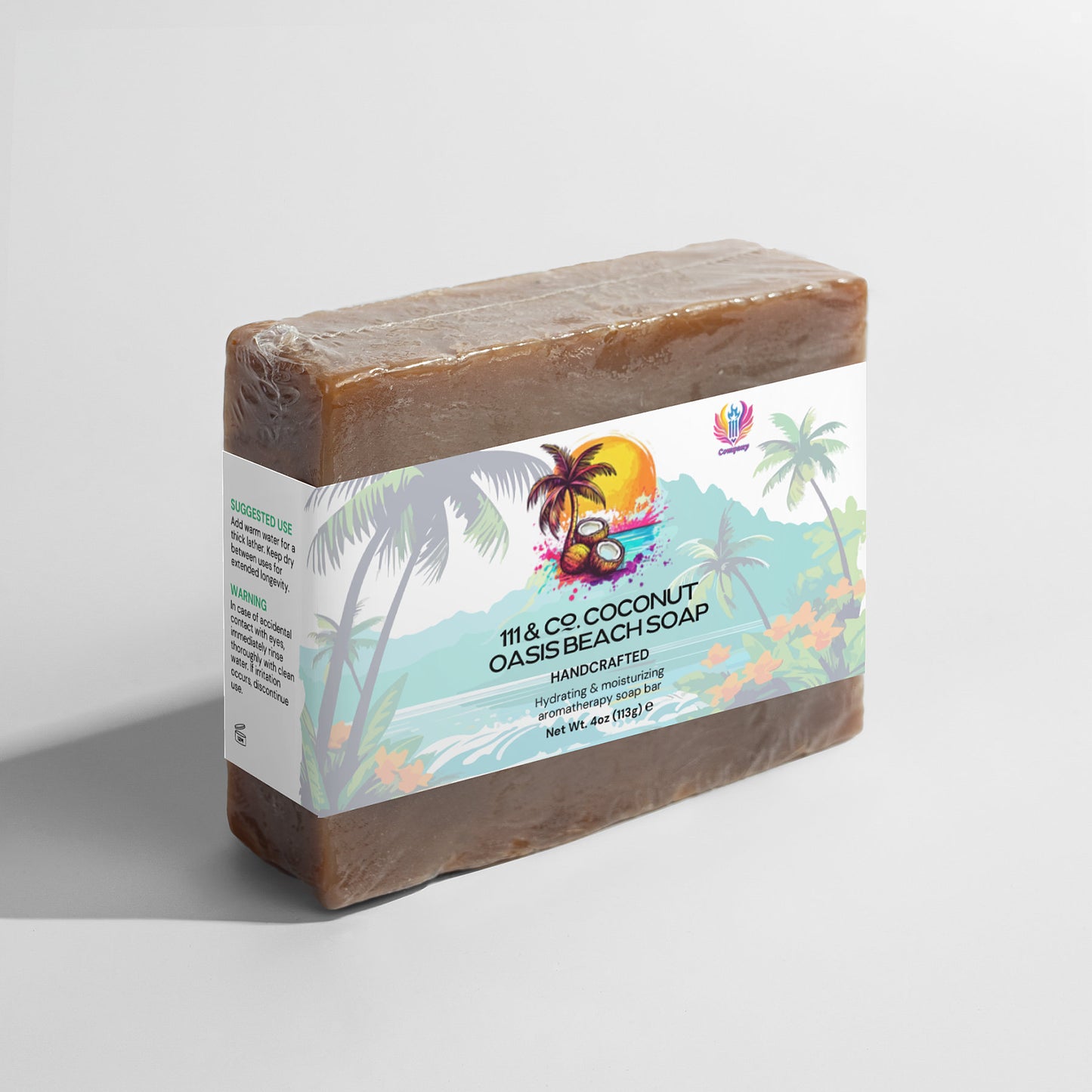 The 111 & Company Coconut Oasis Beach Soap is a handcrafted bar with a textured, brown appearance, wrapped in a tropical label. It highlights hydrating and refreshing properties for sensitive skin, enriched with organic oils, and includes illustrations of palm trees and a sunset.