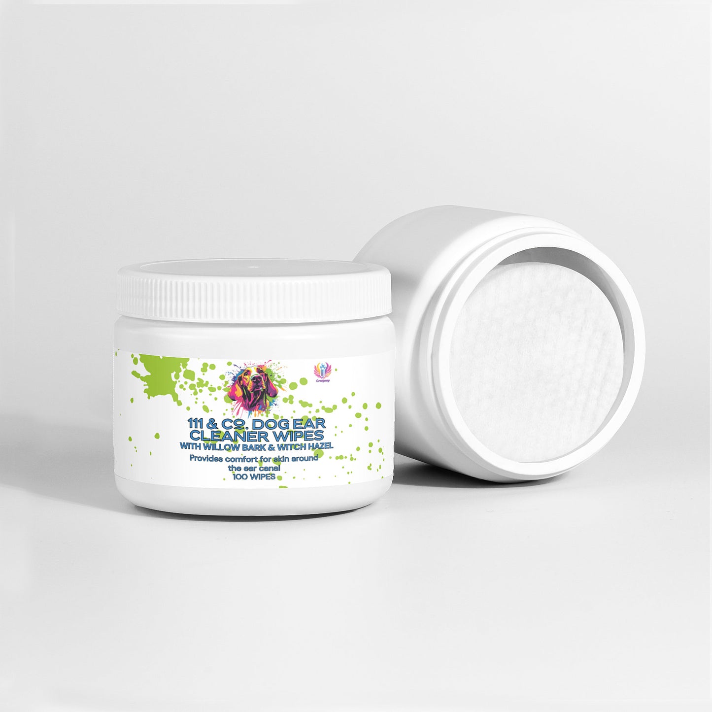 Two white containers of 111 & Company Dog Ear Cleaner Wipes are shown, one upright with a label featuring a vibrant dog illustration, the other on its side with the lid off, revealing wipes made from natural ingredients. Ideal for cleaning floppy ears and providing comfort to dogs and puppies.