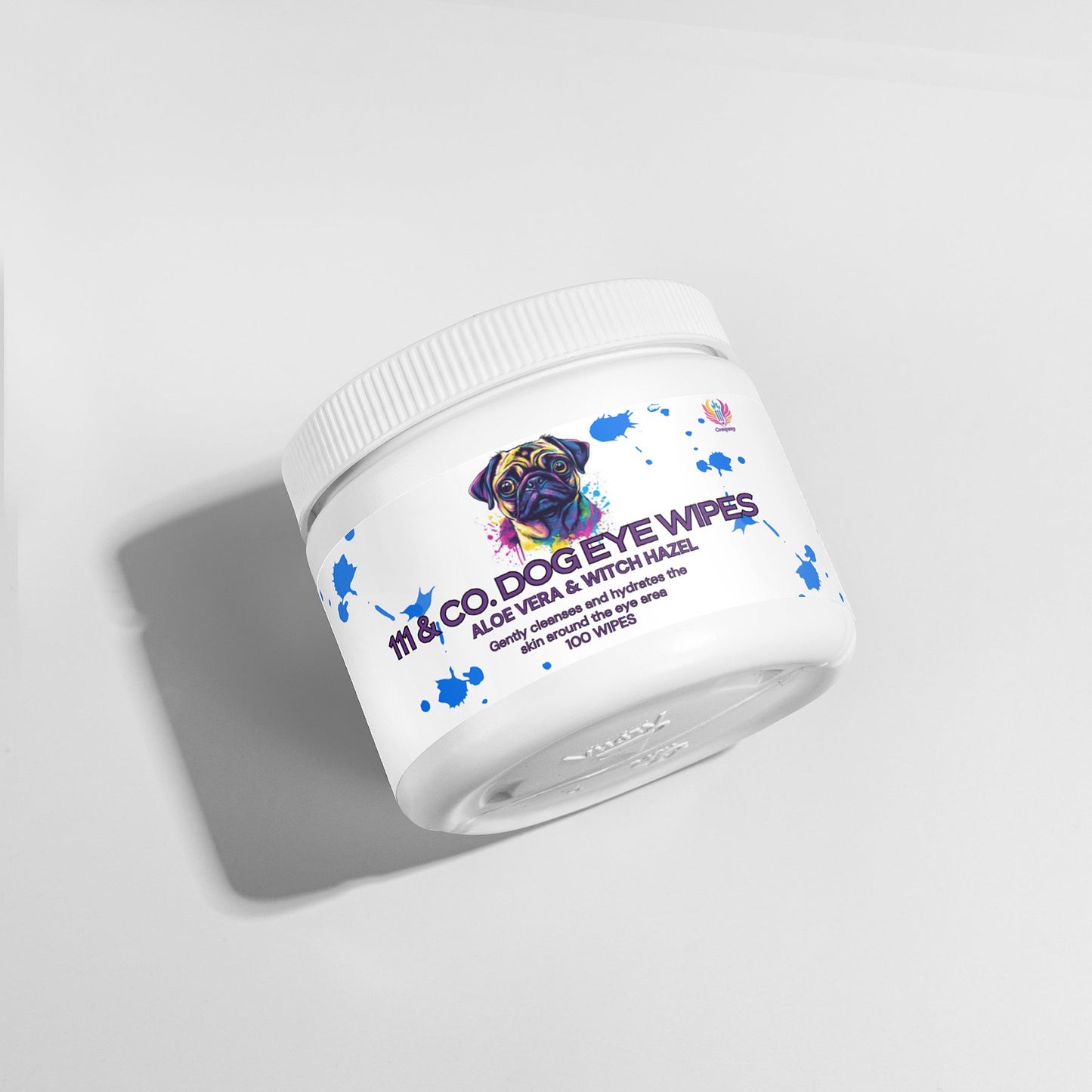 A white container of 111 & Company Dog Eye Wipes rests on a light gray backdrop, featuring a colorful dog illustration and labeled Dog Eye Wipes Aloe Vera & Witch Hazel. It contains 100 wipes for tear stain removal, with natural ingredients. Its shadow is cast to the left.