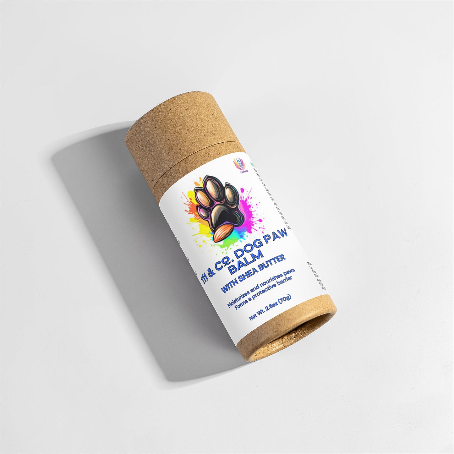 A cylindrical cardboard tube with a colorful label showcasing a black paw print and vibrant splashes. The blue text reads 111 & COMPANY DOG PAW BALM featuring natural shea butter and almond oil. It casts a soft shadow on a white background.