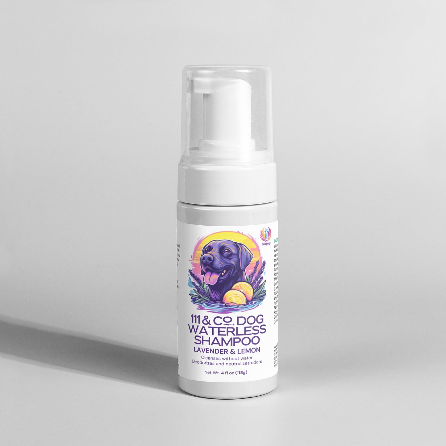A white bottle of 111 & Company Dog Waterless Shampoo features a foam dispenser and a label with a dog surrounded by lavender and lemon slices. It highlights deodorizing agents in the lavender and lemon-scented formula for dogs, with a net weight of 6.4 oz (189ml).
