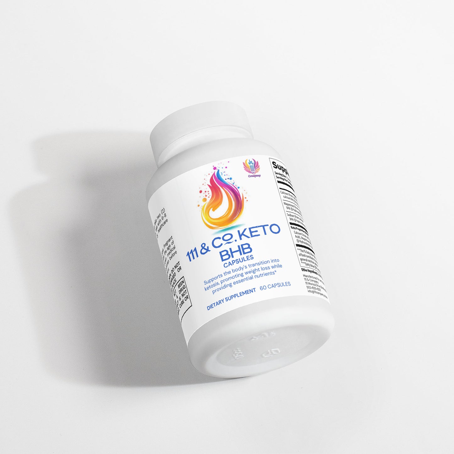 A bottle titled 111 & COMPANY KETO BHB by 111 & Company, with a flame logo, holds 60 capsules of BHB salts. Positioned on a light surface with visible text and barcode, the tilted white bottle casts a shadow.