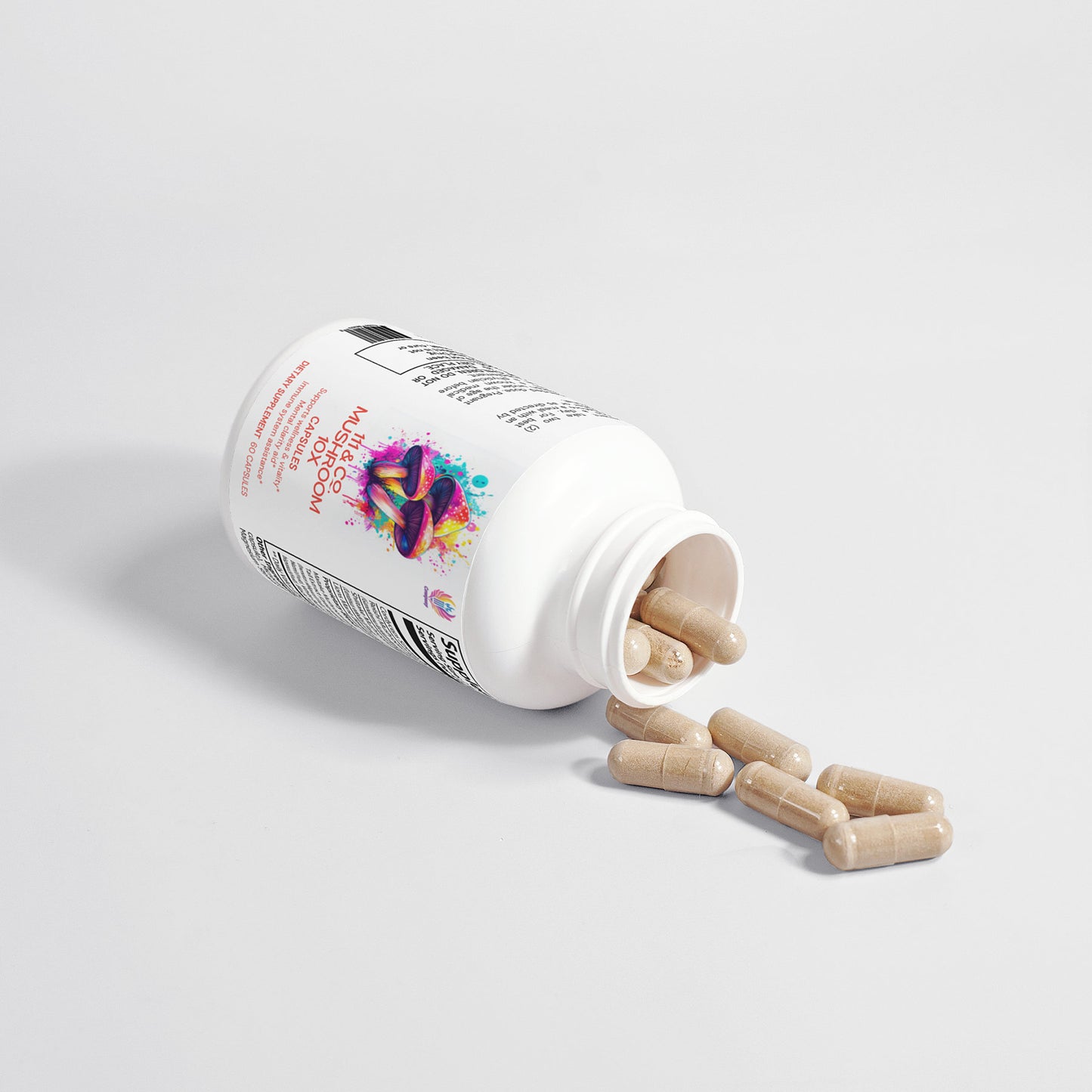 A white bottle labeled 111 & COMPANY MUSHROOM COMPLEX 10 X CAPSULES by 111 & Company is on its side, cap off, spilling beige capsules onto a white surface. The label showcases colorful graphics and text, emphasizing the adaptogenic benefits of these mushroom supplements.