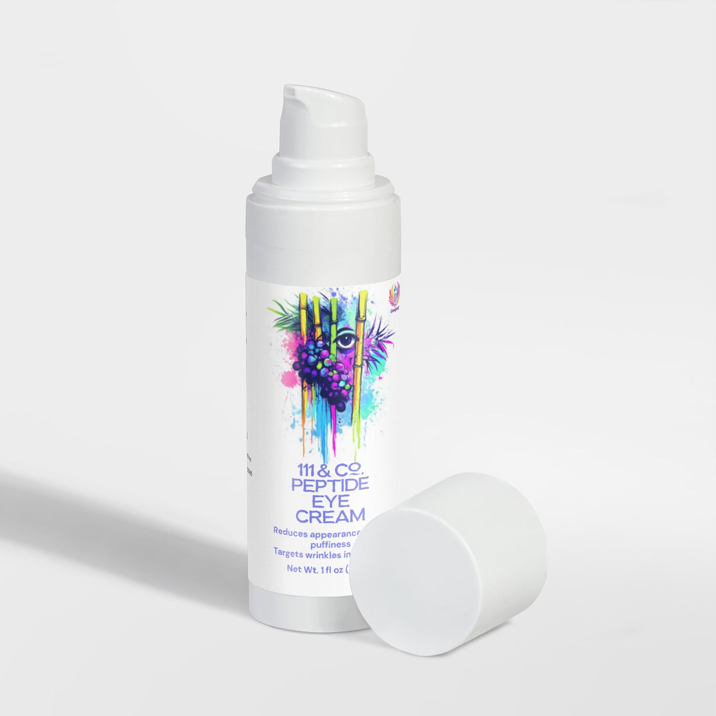 A white bottle of 111 & Company Peptide Eye Cream with a pump stands on a light gray surface, emphasizing its powerful wrinkle reduction benefits. The label features vibrant eye art in purple and teal. Enhanced with sodium hyaluronate, it ensures ultimate hydration.