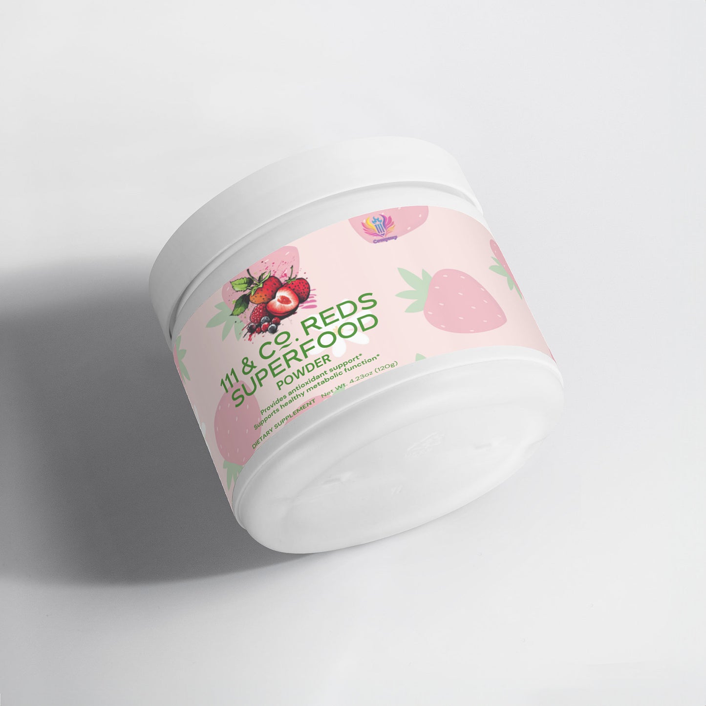 A round white container of 111 & COMPANY REDS SUPERFOOD by 111 & Company is displayed. The label features pink strawberries with green leaves and small red fruits on a pastel pink background, topped by a colorful heart logo. The nutrient-rich supplement leans against a white surface.