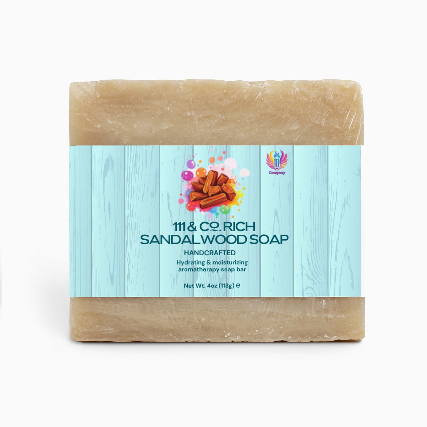 A light beige rectangular soap bar is wrapped in a decorative label with a light blue wood texture and sandalwood illustration. It reads 111 & COMPANY RICH SANDALWOOD SOAP, Handcrafted, Moisturizing Aromatherapy Soap Bar for Sensitive Skin by 111 & Company.