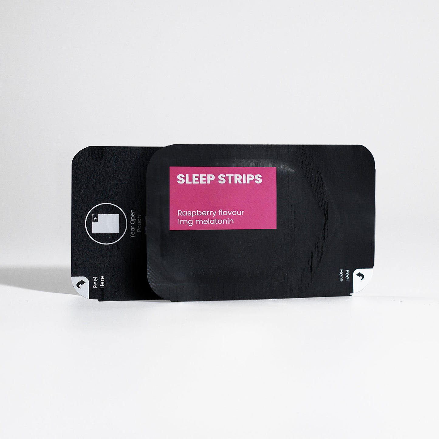 111 & COMPANY SLEEP STRIPS BAG, a black packet with a pink label, displays SLEEP STRIPS and Raspberry flavour 1mg melatonin as an effective non-addictive sleep aid. It rests on a white background with a tear-off tab on the left.