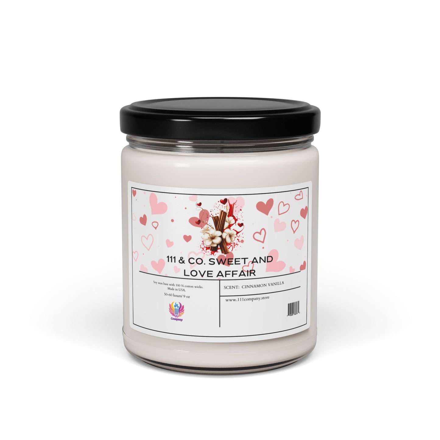 The 9oz Soy Wax Candle, 111 & Co. Sweet and Love Affair, features a warm cinnamon vanilla scent in a clear glass jar with a black lid. The label showcases pink and red hearts, cinnamon sticks, and vanilla flowers. Perfect for cozy moments. Visit the company website for more details.