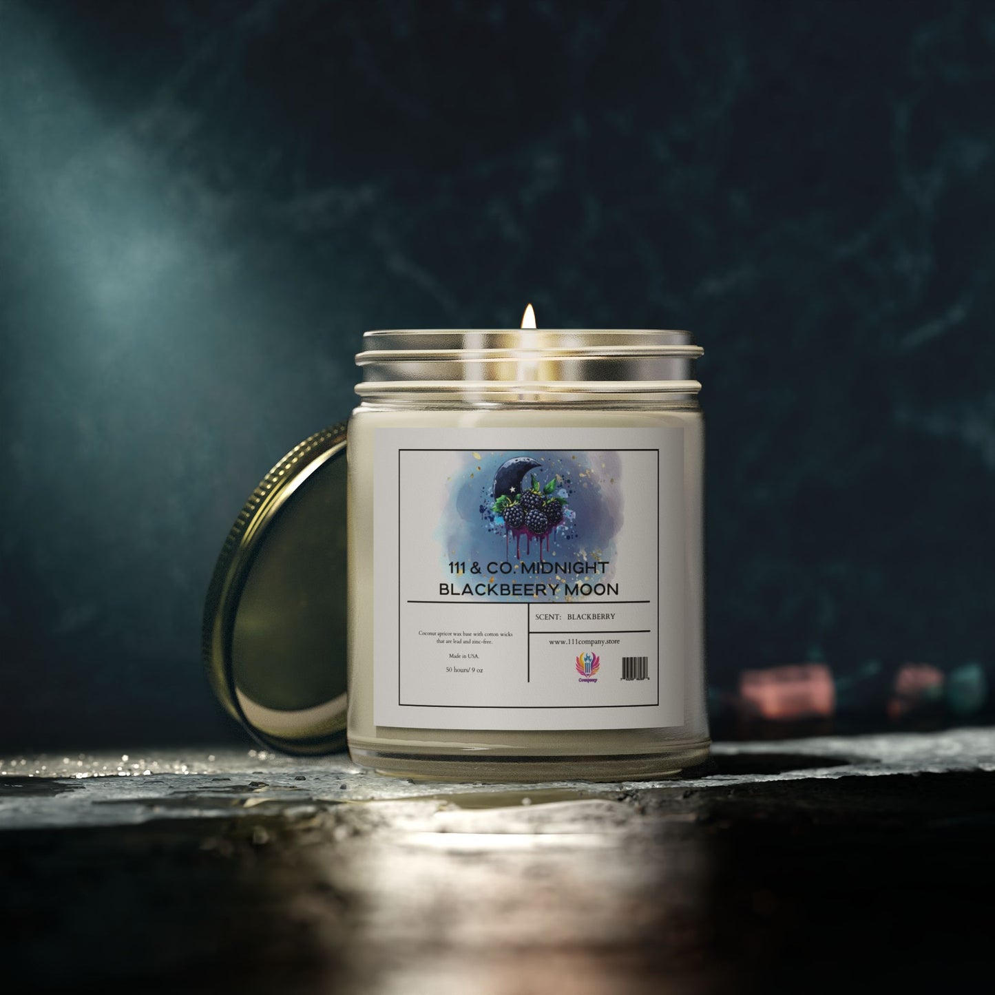 A lit 111 & Company Midnight Blackberry Moon scented candle from Printify, crafted with Coconut Apricot Wax, sits in a glass jar on a dark surface. Its label features a wolf howling at the moon, evoking a moody atmosphere against the dimly lit background.