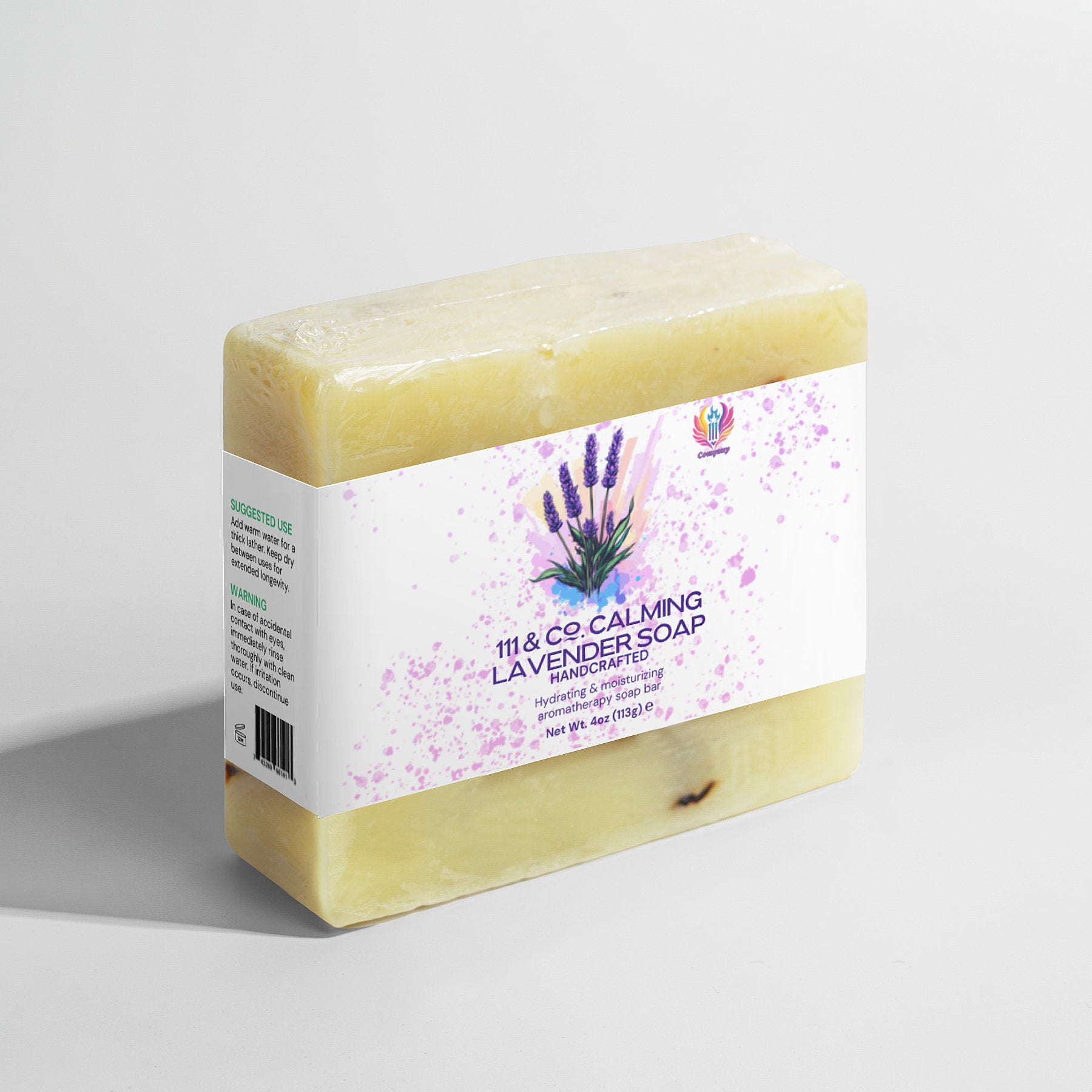 The 111 & Company Calming Lavender Soap features soothing lavender designs and ingredient details, enhanced with calming lavender essential oil. Ideal for sensitive skin, this beige 6 oz (170g) bar sits against a pristine white background.