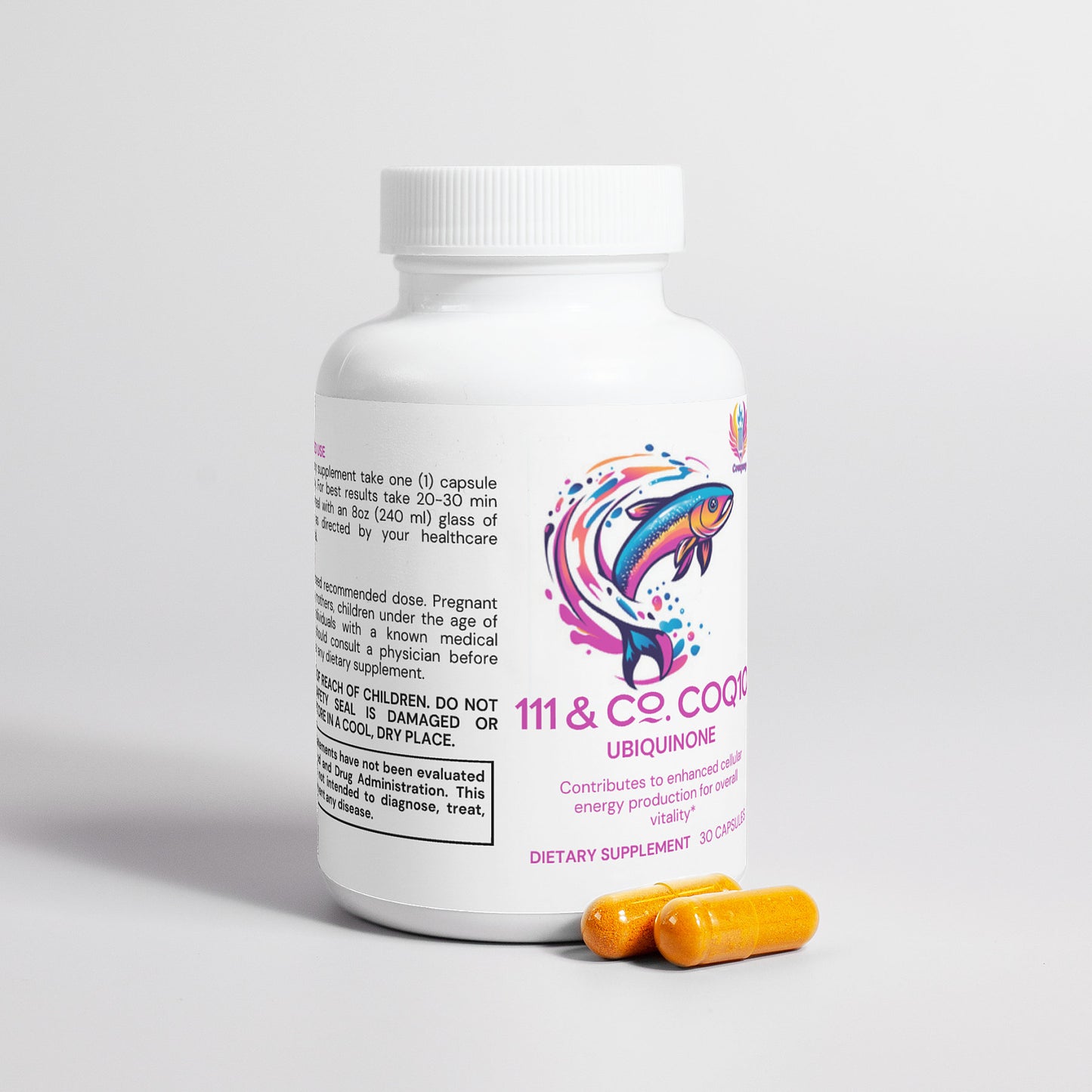 A white bottle labeled 111 & Company CoQ10 Ubiquinone is next to two yellow capsules, featuring a colorful fish design. The label includes dosage, storage, and warnings. This dietary supplement supports energy production and offers 30 servings per container.