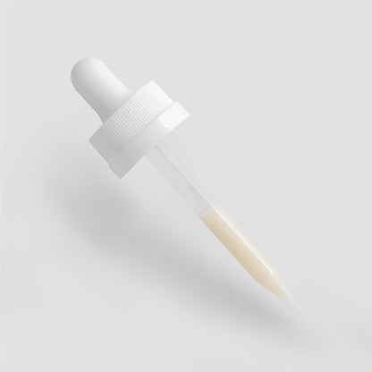 The 111 & Company Dark Spot Serum for Normal Skin features a white dropper with a ribbed grip cap and clear glass pipette, holding a light yellow serum. It is set diagonally on a light gray background, tip pointing downward, designed to reduce dark spots and promote an even skin tone.
