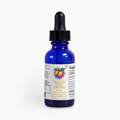 A blue bottle with a black dropper cap labeled 111 & COMPANY DIET DROPS ULTRA 1 oz by 111 & Company, displays fruits on the front and claims to boost metabolism. This 1 fl oz dietary supplement has ingredients and directions visible on the side.