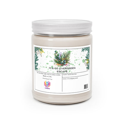 The 111 & Company Evergreen Escape candle by 111 & Company features a white jar with green foliage, yellow flowers, pine cones, and a small red and purple logo. It boasts a soy wax blend, 100% cotton wicks, eucalyptus scent, 50-60 hour burn time, and is made in the USA.