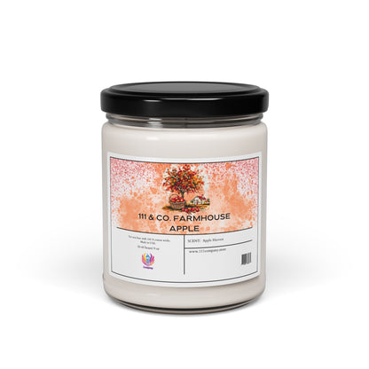 The 111 & Company Farmhouse Apple Harvest Candle features an illustrated apple tree on a white jar with a black lid. This eco-friendly, scented soy candle has a long-lasting burn time. A QR code and website URL are on the bottom against a white background.
