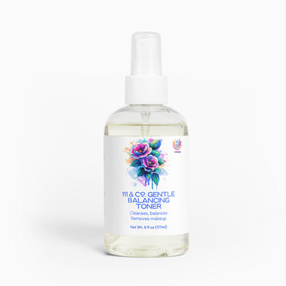 A clear bottle with a white nozzle labeled 111 & Company Gentle Balancing Toner for sensitive skin features floral artwork with purple and blue flowers. It states Cleanses, balances, removes makeup, contains green tea, and holds 6 fl oz (177 ml) of translucent liquid.