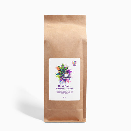 A 16oz brown paper bag of 111 & Co. Hemp Coffee Blend features a white label with colorful graphics of a hemp leaf and coffee cup. It’s freshly ground with roasted hemp seeds, offering stimulating, non-habit forming qualities. Brand: 111 & Company.