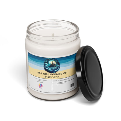 The 111 & COMPANY LEGENDS OF THE DEEP ATLANTIS WHISPER scented candle by 111 & Company features ocean waves and a ship design. The eco-friendly soy wax candle is white in a glass jar with a black lid. A bottom label includes the logo and URL.