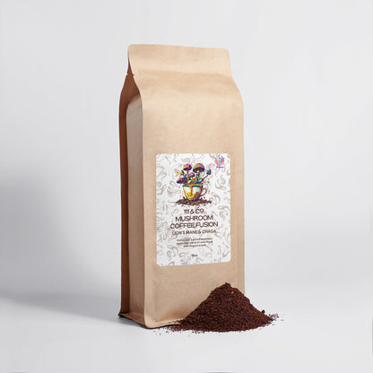 The 111 & Company Mushroom Coffee Fusion - Lions Mane & Chaga 16oz bag, featuring decorative art, stands on a white background. Slightly open at the top, dark coffee grounds mixed with Lions Mane mushrooms spill from the bag, forming a small mound at its base.