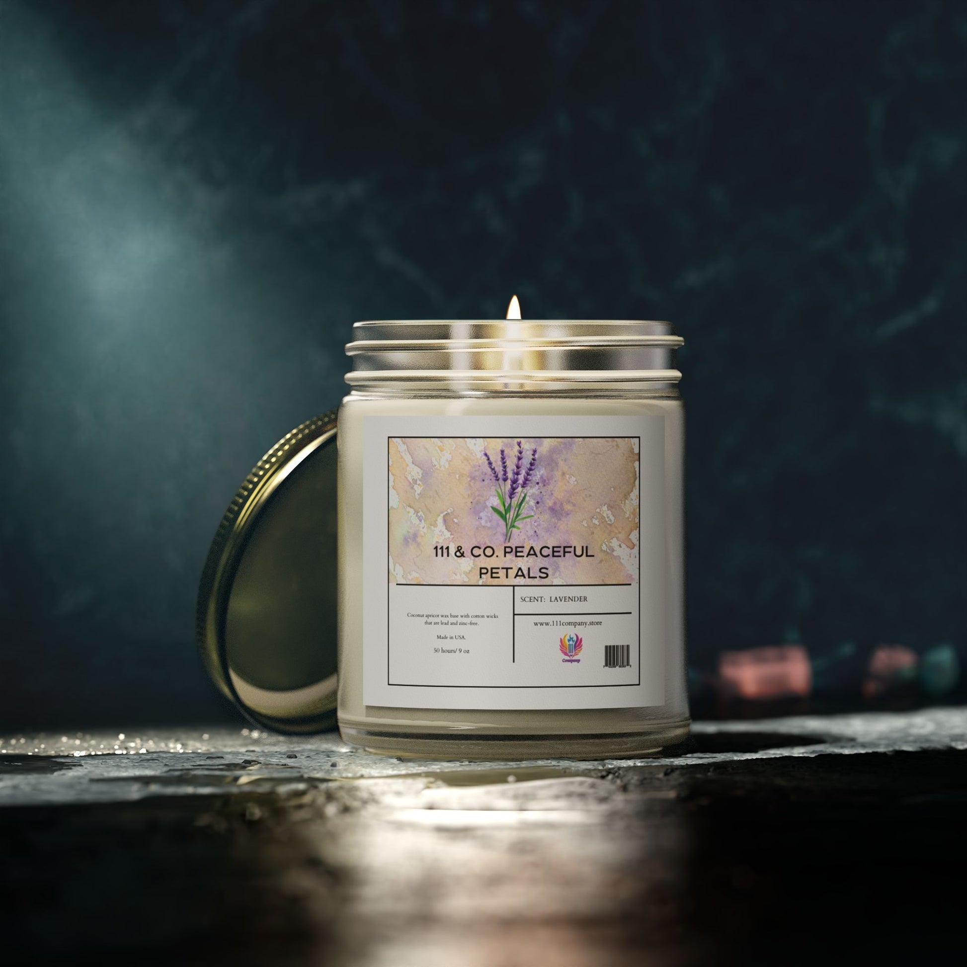 A lit candle from 111 & Company, labeled 111 & Company Peaceful Petals, sits in a clear glass jar with a metallic lid. Made from eco-friendly coconut apricot wax, it emits soft, warm lavender-scented light on a textured dark surface against a blurred background for ultimate relaxation.