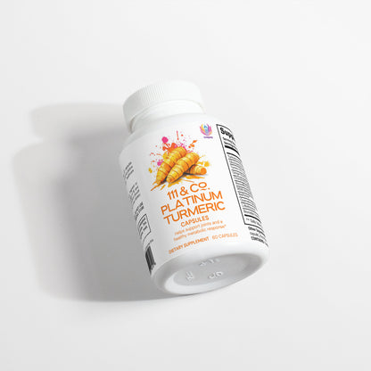 A white plastic bottle of 111 & COMPANY PLATINUM TUMERIC CAPSULES from 111 & Company lies on its side, highlighting turmeric root graphics and stating Powerful antioxidant and anti-inflammatory with Boswellia Extract. It contains 60 dietary supplement capsules, with more details on the side.