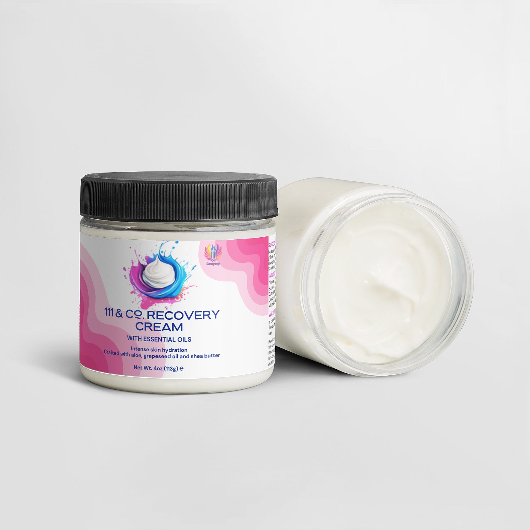 Two jars of 111 & COMPANY RECOVERY CREAM by 111 & Company are displayed. One, upright, has a white and pink label with a swirl design, black lid, and details in blue and pink text. The other jar lies open on its side, showcasing the smooth white cream inside—a testament to superior skin hydration.