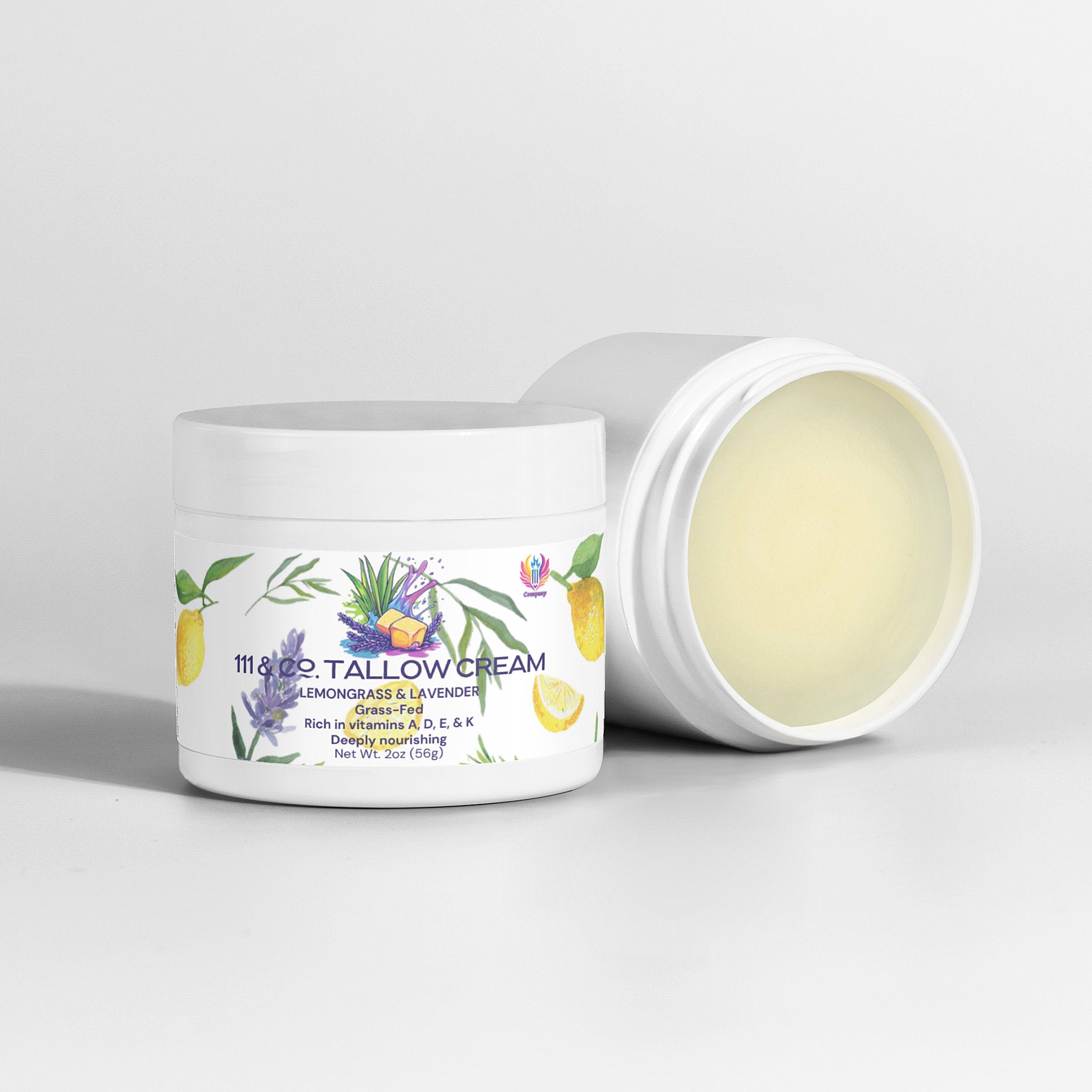 Two white jars of 111 & Company Tallow Cream Lemongrass & Lavender, one open and one closed, sit on a light background. The label displays lemongrass, lavender, and lemon illustrations, emphasizing hydration for sensitive skin.