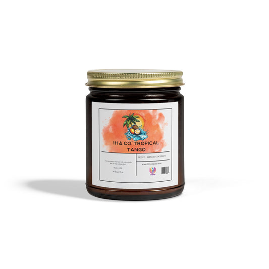 The 111 & Company Tropical Tango candle in a dark amber jar with a gold lid features eco-friendly label art of coconuts and palm trees. The tropical mango coconut fragrance symbolizes the brand 111 & Company, and website along with social media icons are at the bottom.