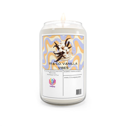 A white glass jar labeled 111 & Company Vanilla Vibes features vanilla and tonka bean images on a colorful wavy background. The candle is 13.75 oz soy wax with a single wick, the 111 & Co logo, and a website URL. Brand: 111 & Company.