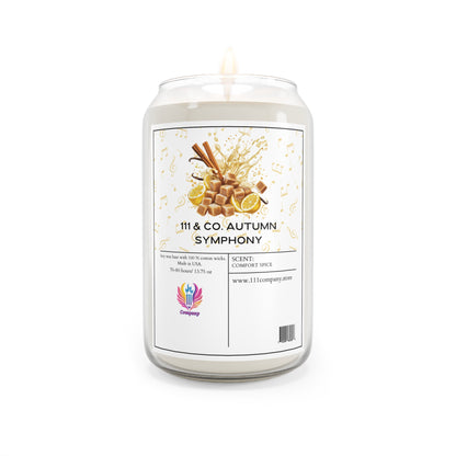 The Printify candle, 111 & Company Autumn Symphony, offers a cozy ambiance with its Comfort Spice scent. The glass jars label features cinnamon, lemon, nutmeg, and musical notes, reflecting the eco-friendly autumn spirit. A logo and website URL are displayed below.