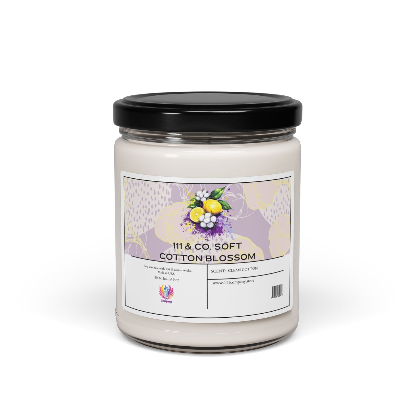 This eco-friendly glass jar candle with a black lid and vibrant floral label reads 111 & Company Soft Cotton Blossom Scented Candle. It offers a Clean Cotton scent and promises long burn time. Visit www.111coagency.com for more details. Brand: Printify, Soy Wax 9oz.