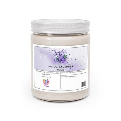 This Printify candle features a white jar with a minimalist label adorned with purple lavender and green leaves. The 9oz 111 & Co. Lavender Haze scent combines eucalyptus and lavender, crafted with a natural soy wax blend and cotton wick in the USA.