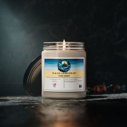 A 9oz soy wax Atlantis Whisper candle by Printify, labeled 111 & Company Legends of the Deep, with an ocean wave graphic, glows warmly in a glass jar on a dark textured surface. Dim lighting highlights its eco-friendly nature amidst blurred objects.