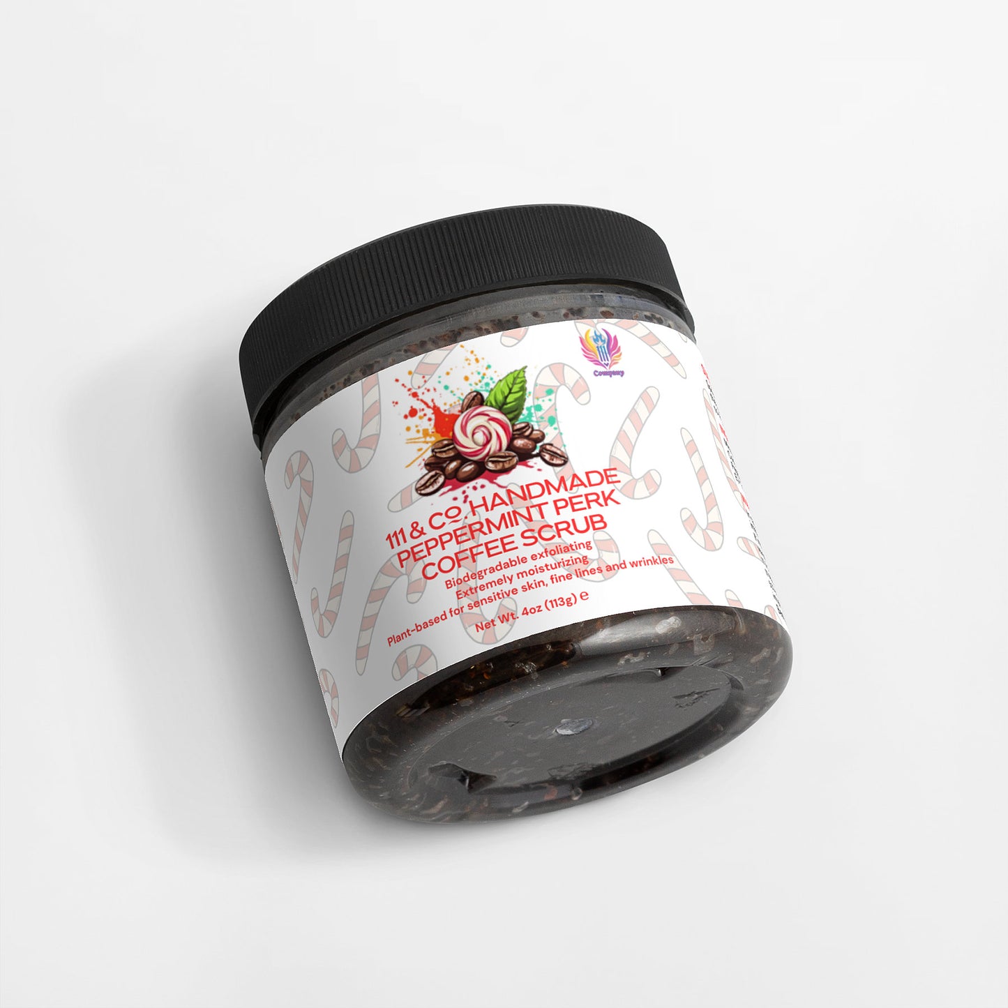 A clear jar with a black lid contains the 111 & Company Handmade Peppermint Perk Coffee Scrub, rich in antioxidants. The white label, featuring a colorful candy illustration, indicates a 4 oz weight. A candy cane pattern subtly highlights exfoliation and adds a festive touch.