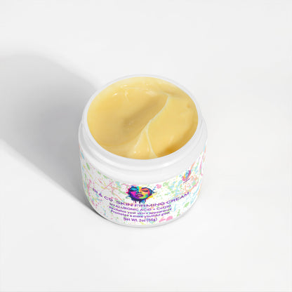 Open jar of 111 & COMPANY SKIN FIRMING CREAM by Retro Fitness Supplements, featuring a colorful abstract design. This rich cream with a light yellow hue is infused with hyaluronic acid, CoQ10, and DMAE, showcasing its luxurious texture against a pristine white background.