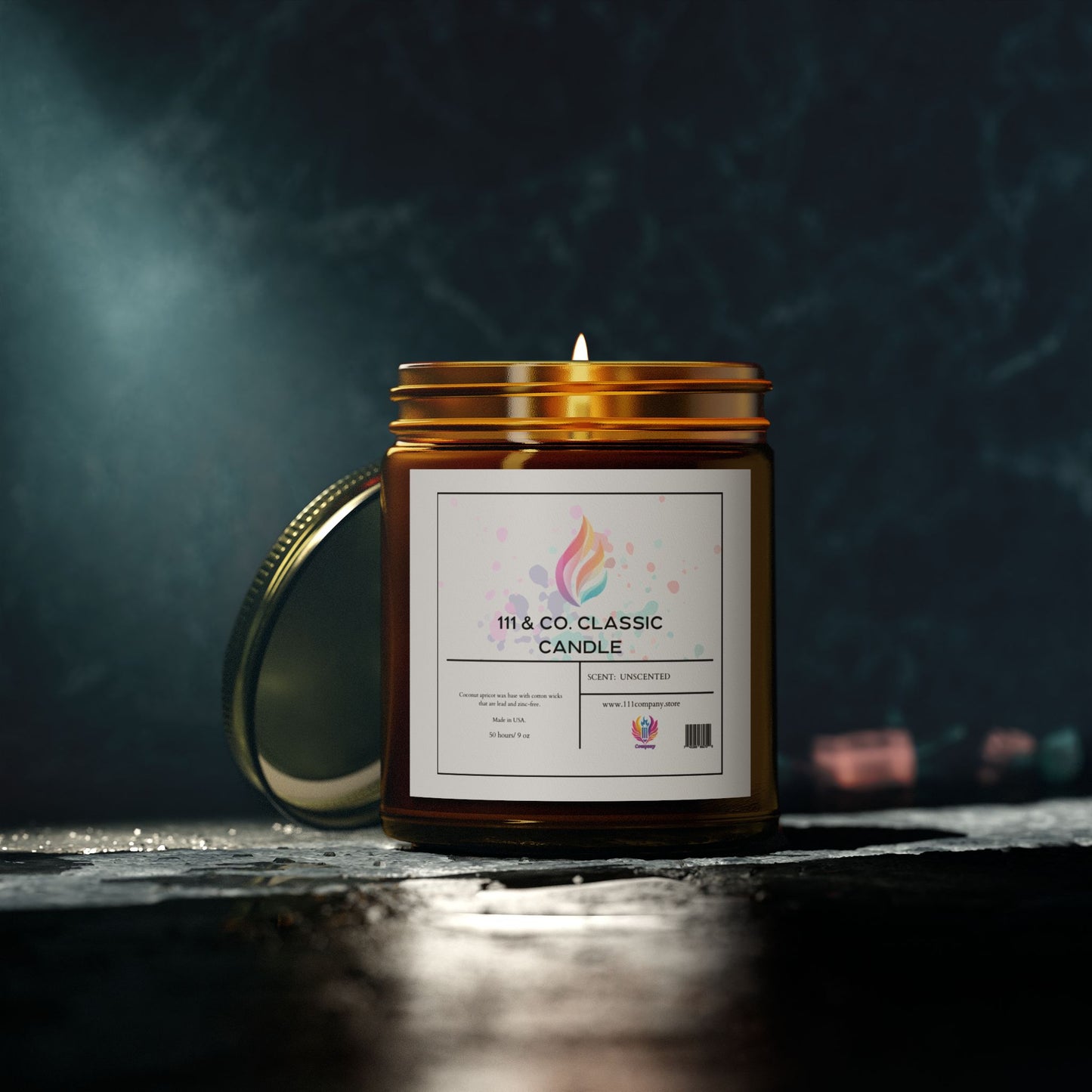 An amber jar candle with a metal lid rests on a textured surface. The Printify 111 & Company Classic Unscented Candle label features a flame graphic. Made from coconut apricot wax, the candles calming glow stands out against the dark, blurred background, softly spotlighting its warmth.