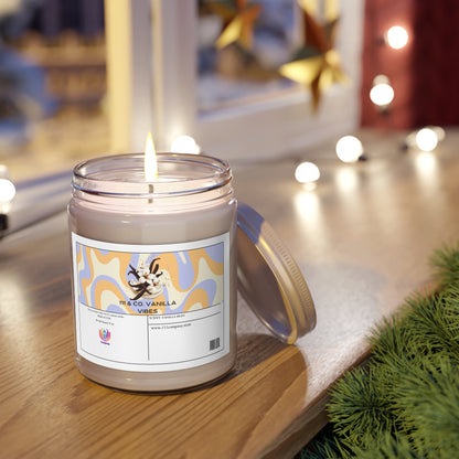 A lit Printifys 111 & Company Vanilla Vibes Vanilla Bean scented candle, crafted from a soy wax blend in a glass jar, sits on wood beside a window. The label depicts vanilla flowers and patterns; the lid rests next to it. String lights and green foliage enhance the cozy festive atmosphere.