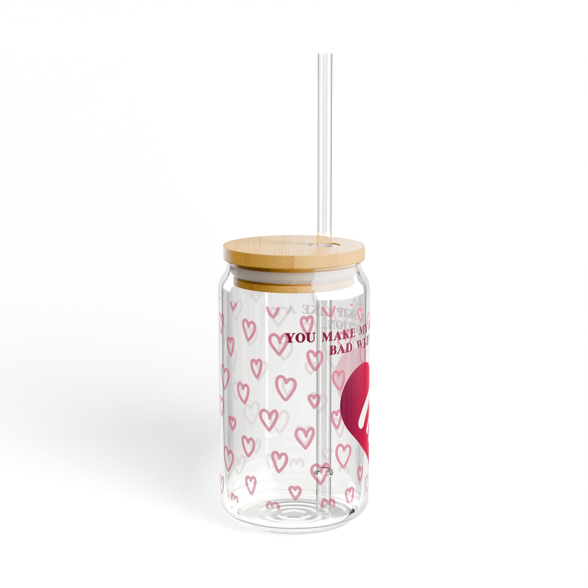 The Valentines WiFi Sipper Glass (16 oz) is a charming piece featuring pink heart patterns, a bamboo lid, and a transparent straw. You make my is inscribed between hearts, making it a whimsical addition to any barware collection.